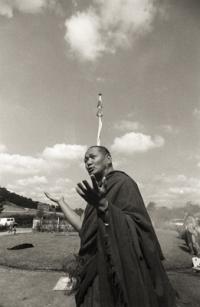 Lama Yeshe at an outdoor puja  to celebrate the end of the first year of a geshe studies course, Manjushri Institute, England, 1979.